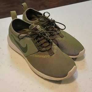 Green Nike running shoes